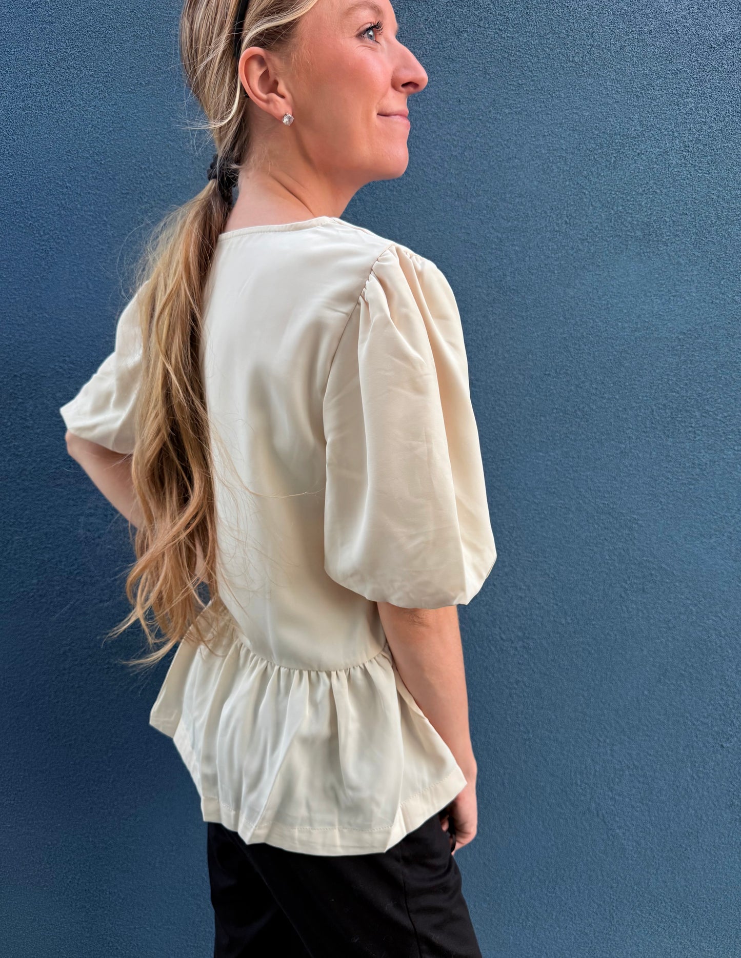 The Bow & Flow Peplum Blouse